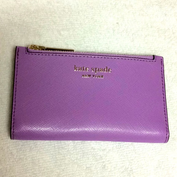 kate spade Handbags - Lilac Kate Spade small slim bifold wallet